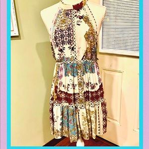 Woman’s backless boho dress.